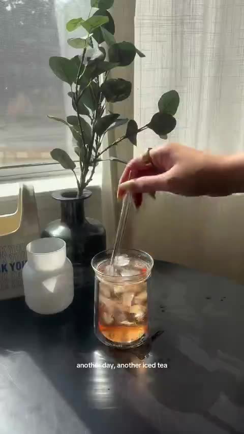 Iced dandelion tea brewed by a window