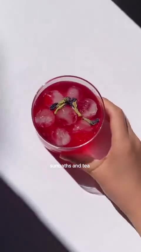 Hibiscus over ice, poured from a mug