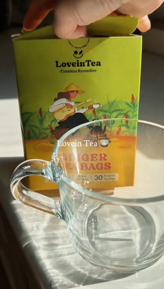 Opening the Ginger box over a glass mug