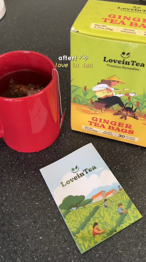 Red mug of ginger tea beside the Ginger box