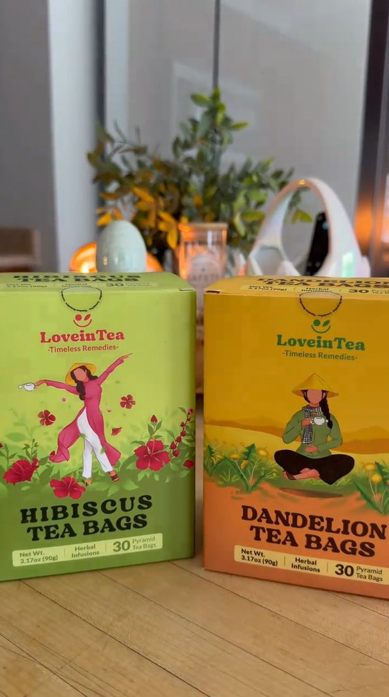 Hibiscus and Dandelion boxes on a wooden table
