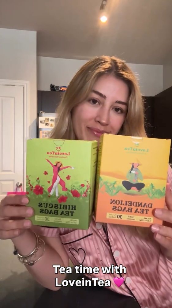 Creator holding Hibiscus and Dandelion boxes